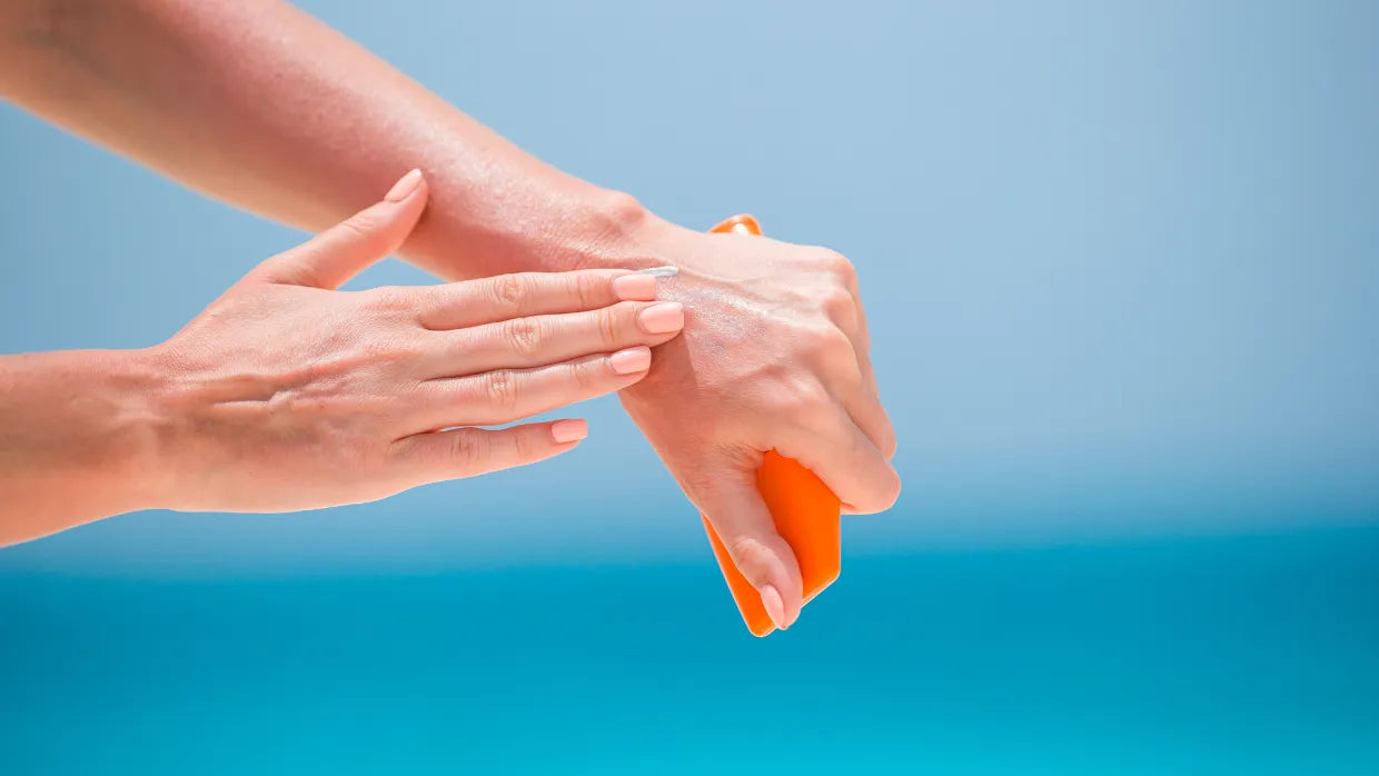 A person applying gel sunscreen on sensitive skin, showcasing its lightweight and soothing texture.