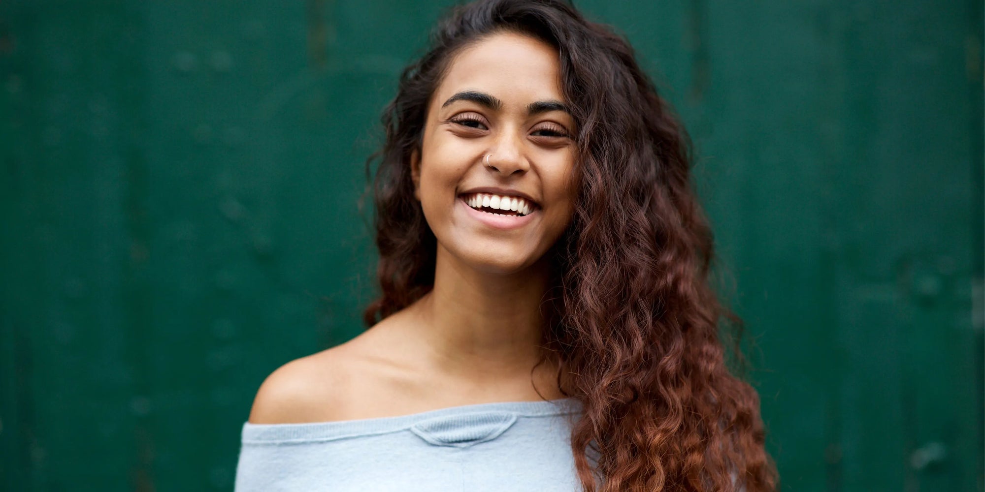 Close-up of oily skin with acne, highlighting causes and effective skincare solutions.