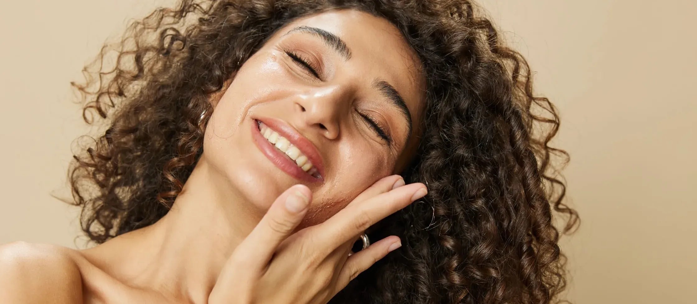 A person applying a soothing acne treatment cream for clear skin and effective acne solutions.