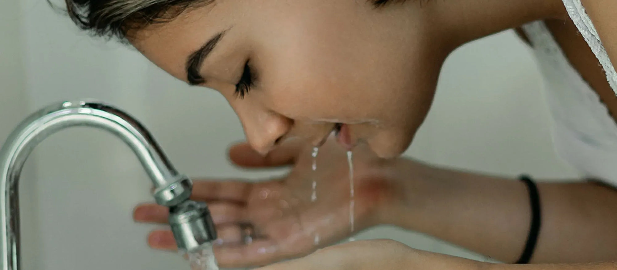 A person applying acne face wash, showcasing its effectiveness for achieving clear skin.