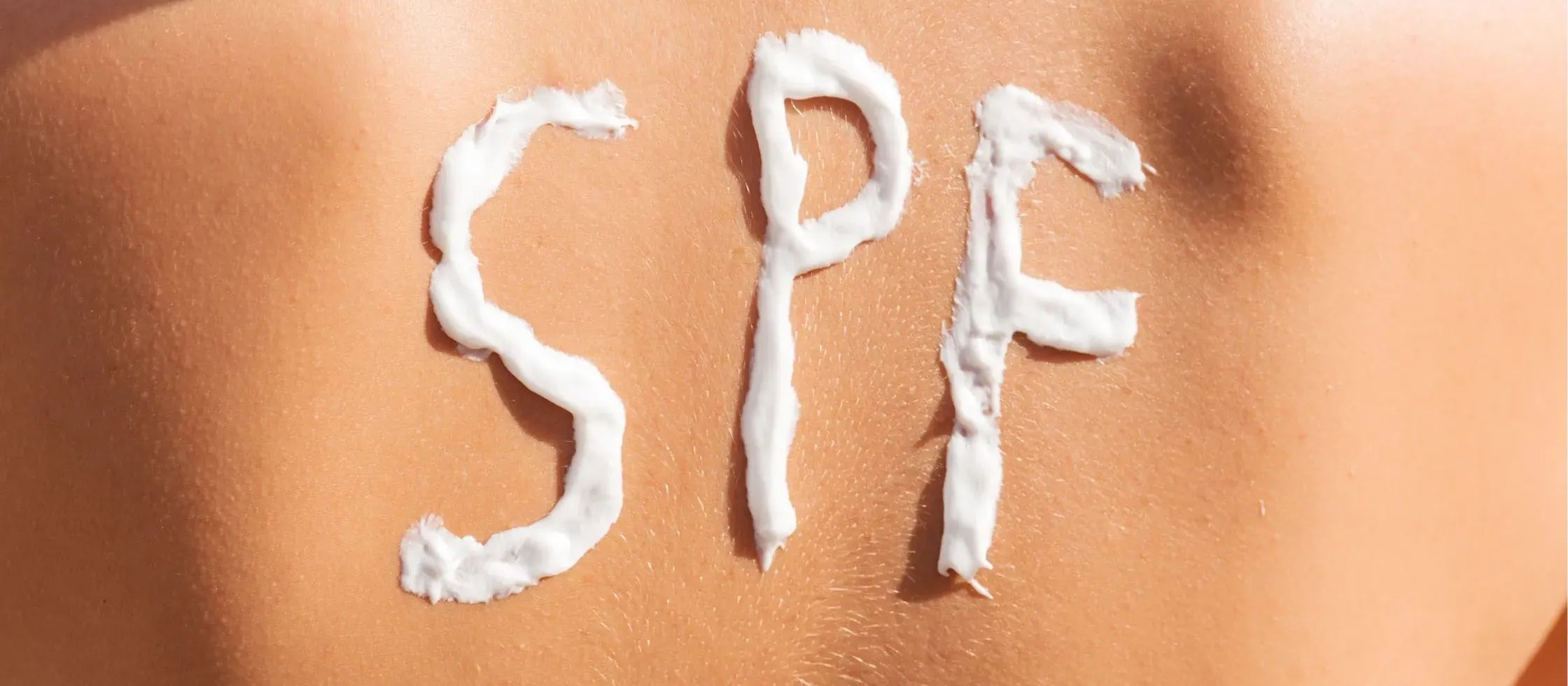 A comparison of SPF 50 and SPF 30 sunscreen textures, highlighting oiliness and skin feel.
