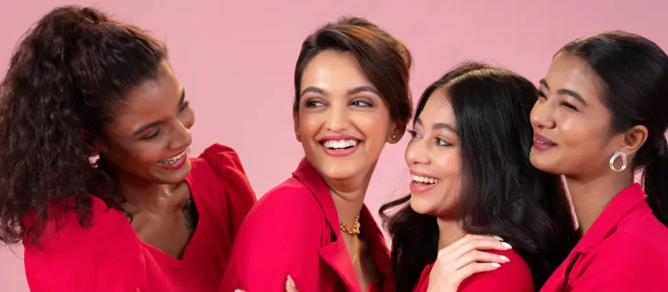 A bottle of sensitive skin sunscreen SPF 50 on a beach, highlighting sun protection for delicate skin.