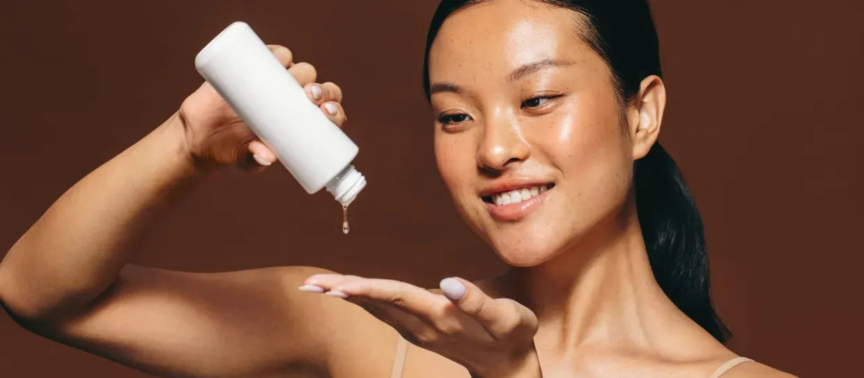 A woman applying acne marks removal face wash, showcasing radiant skin and a fresh glow.