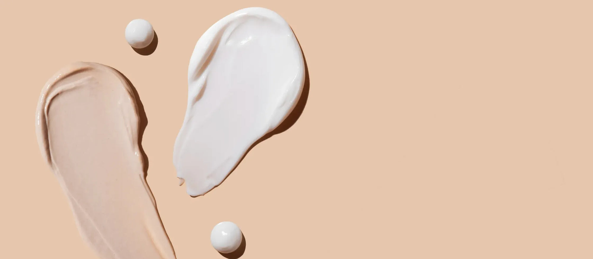 A woman applying anti-acne serum to her face for radiant, clear skin and improved complexion.