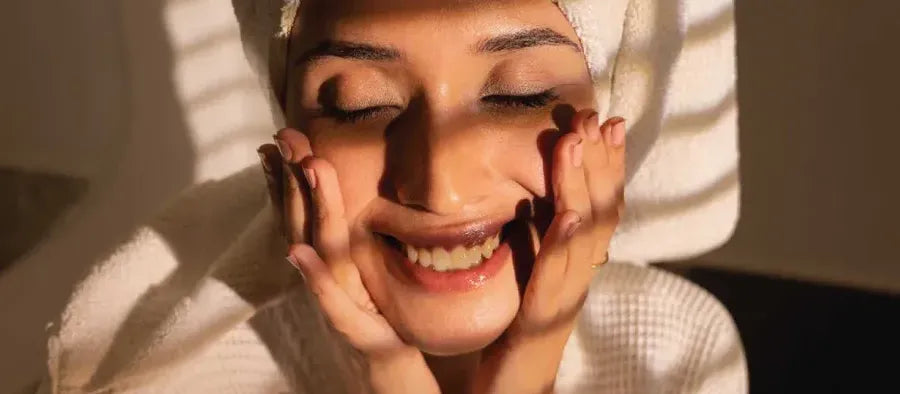 A diverse group of people applying sunscreen, showcasing the best options for all skin types.