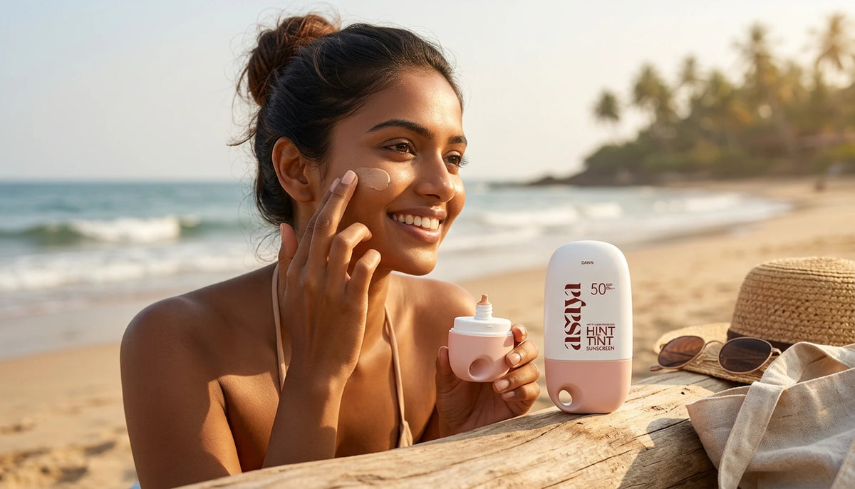 Woman applying sunscreen, focusing on fading acne scars and PIH 